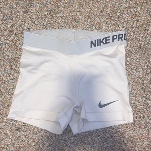 White nike pros